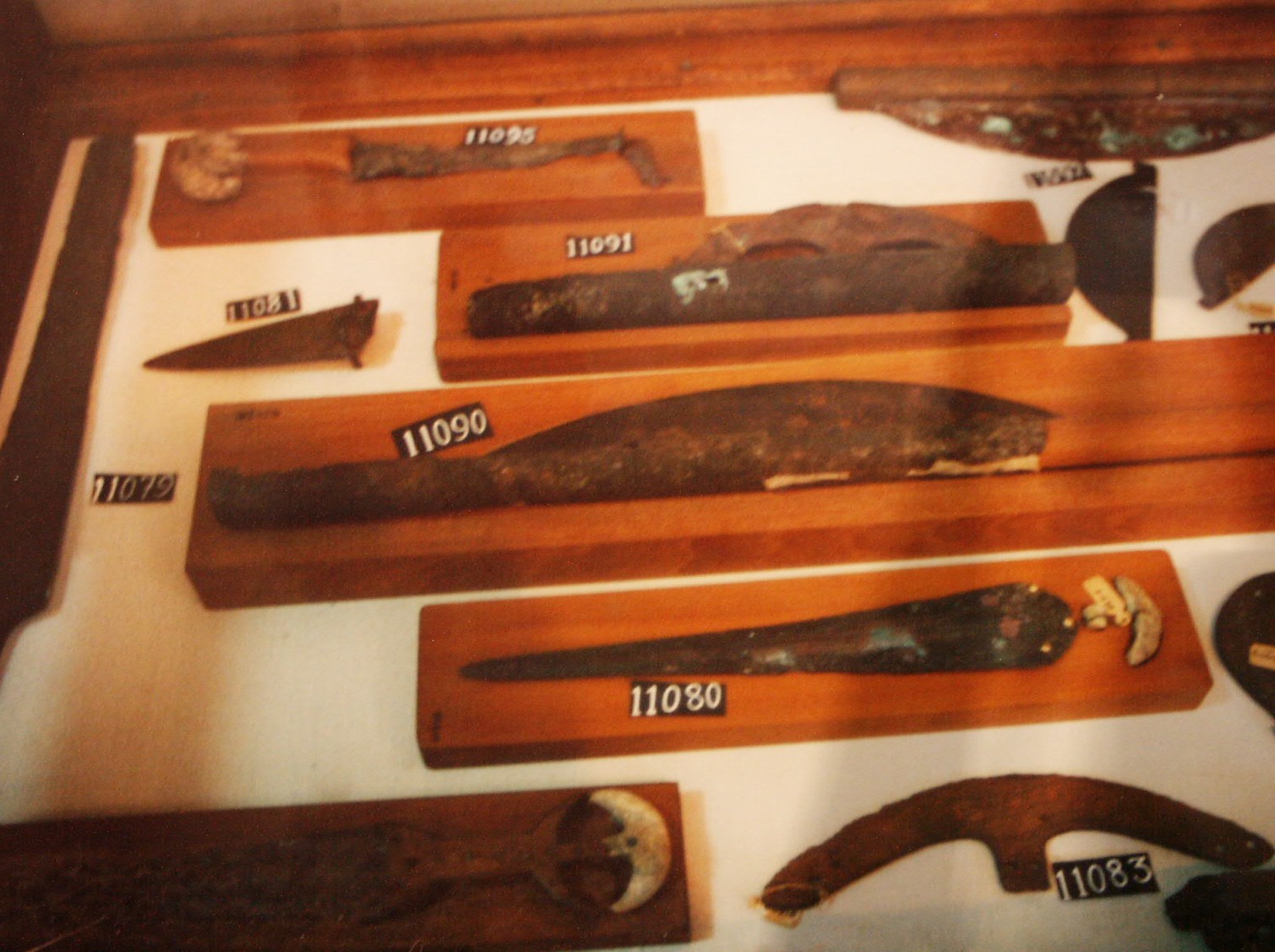 Display case of ancient Egyptian artefacts inside the Egyptian Museum, Cairo